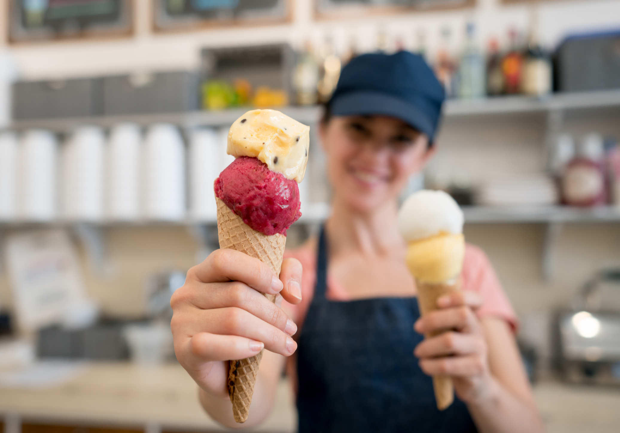 Lady is going to serve ice cream